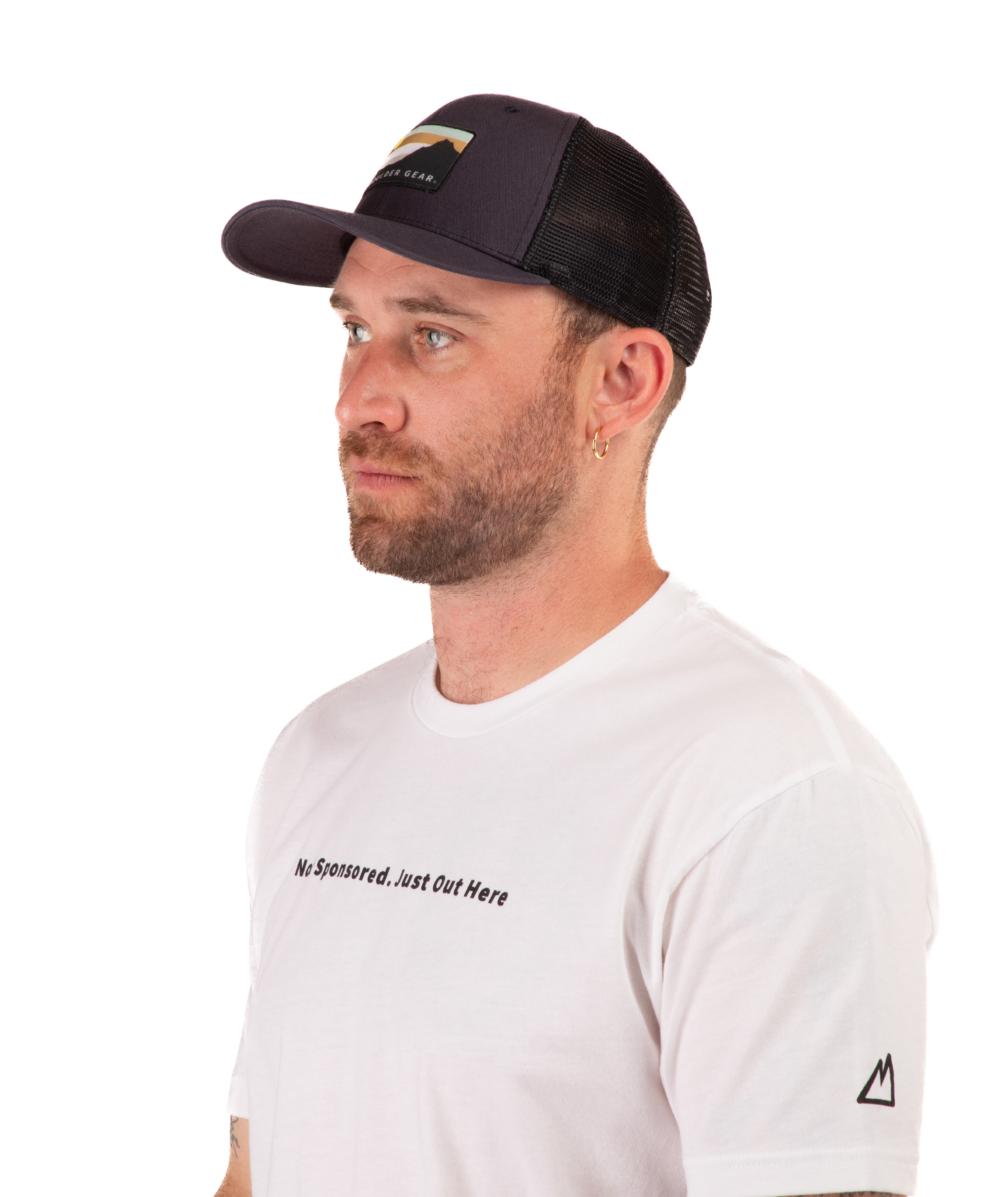 Man wearing a navy cap and white t-shirt with text on a white background