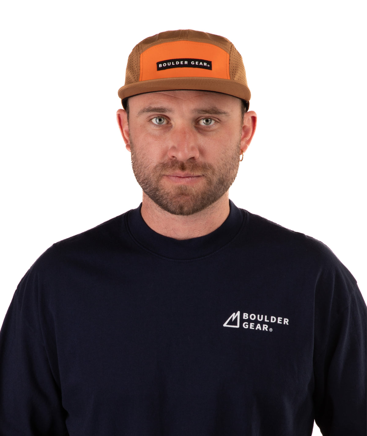 Man wearing a brown cap and navy T-shirt with Boulder Gear logo on a white background