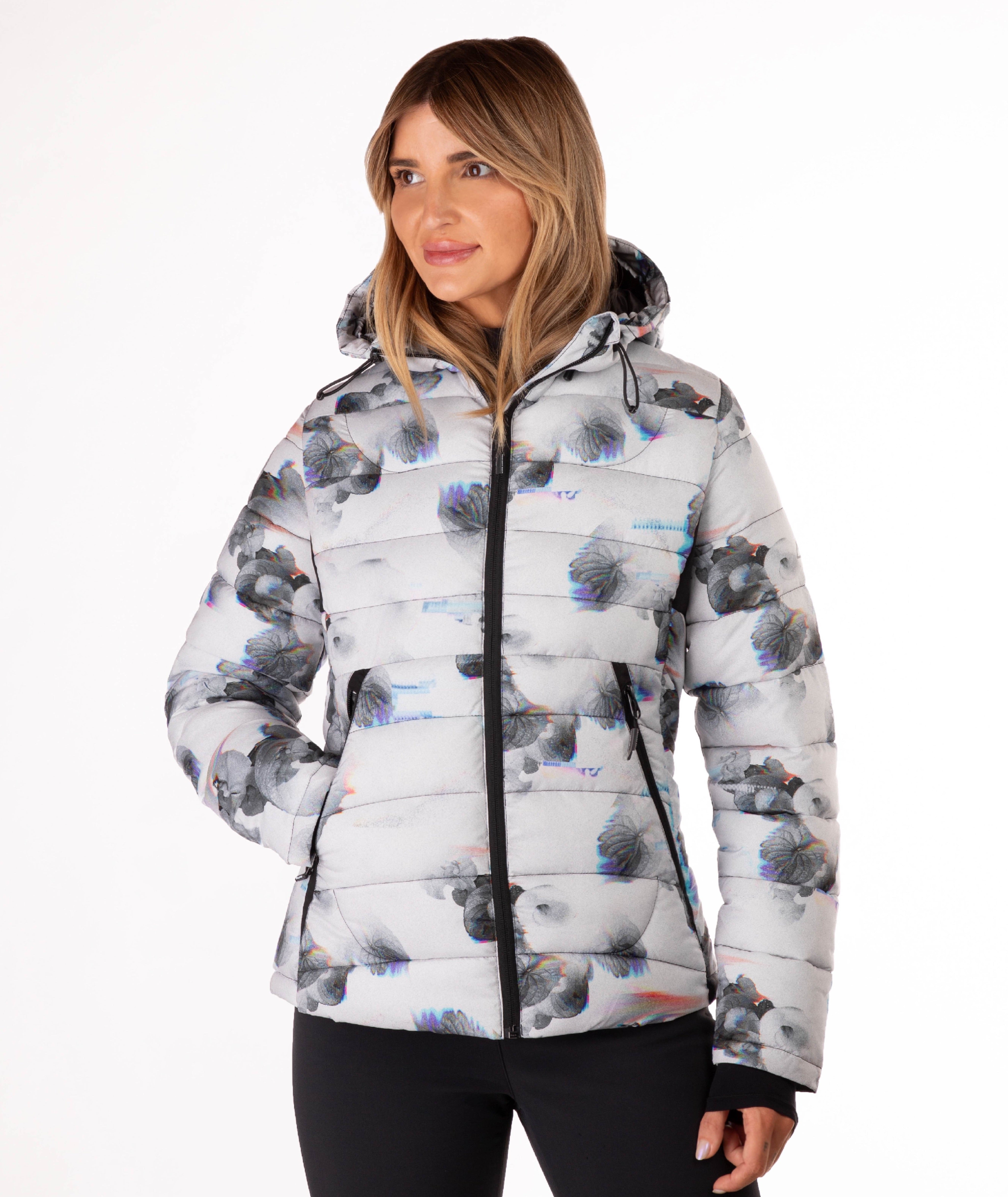 Woman wearing a flower patterned jacket on a white background