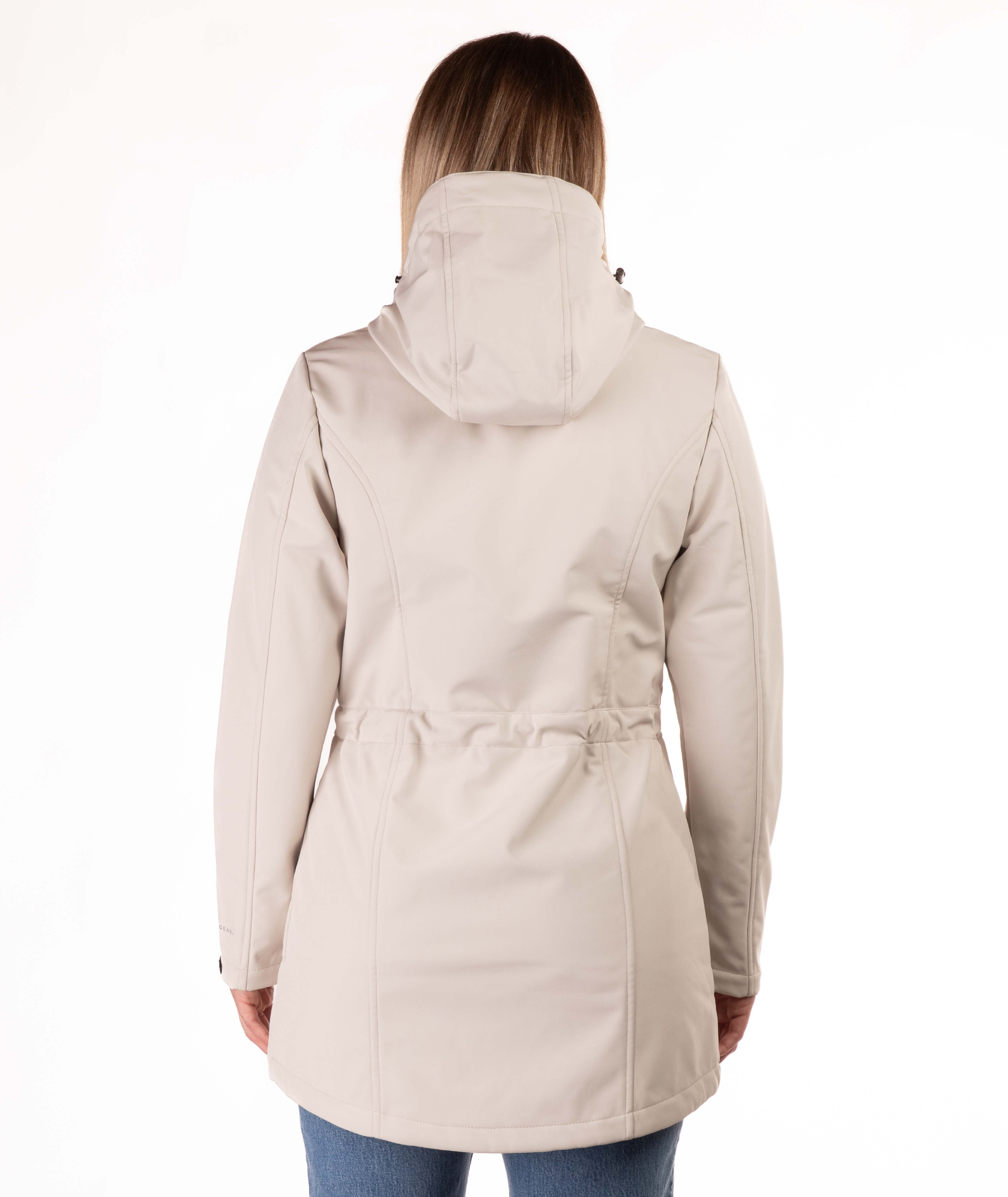 back of beige parka worn by a person on a white background