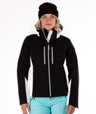 Woman wearing a black and white jacket on a white background