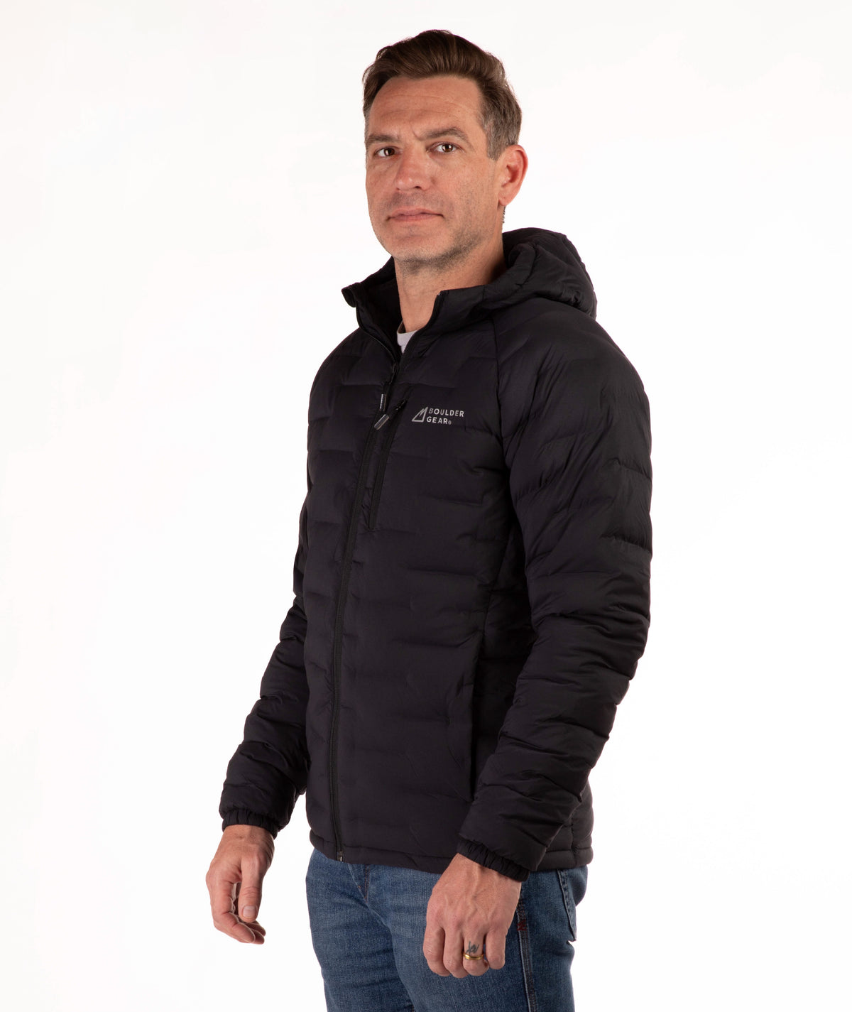 Man wearing a black jacket with a brand logo on a white background