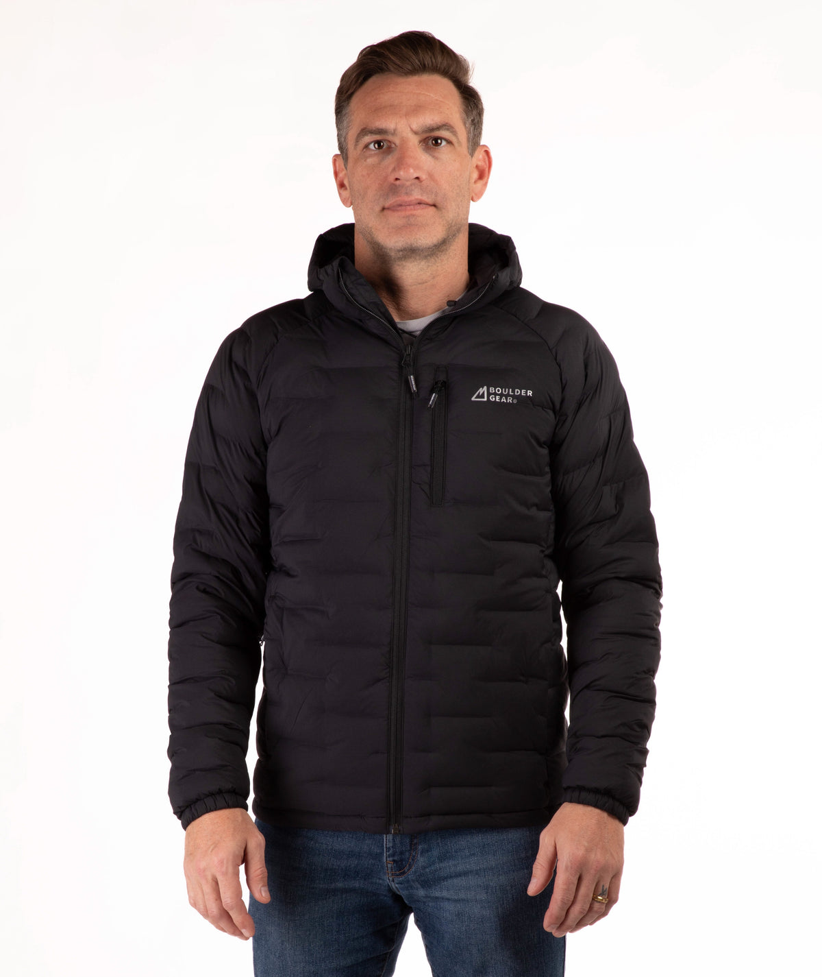 Man wearing a black jacket with a visible brand logo on a white background