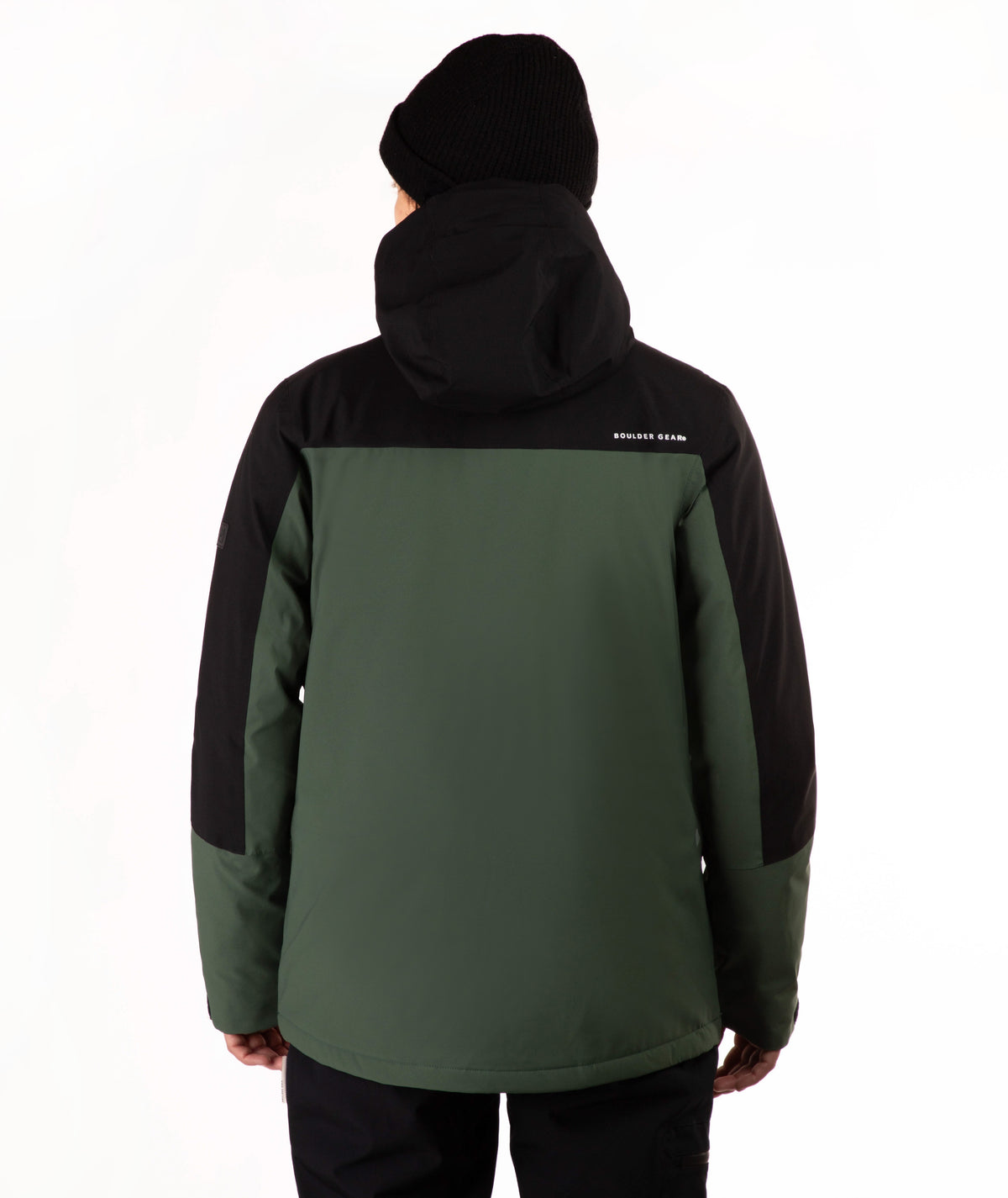 A person shown from the back wearing a color-blocked hooded jacket in dark green and black, along with a black beanie, against a plain white studio background.