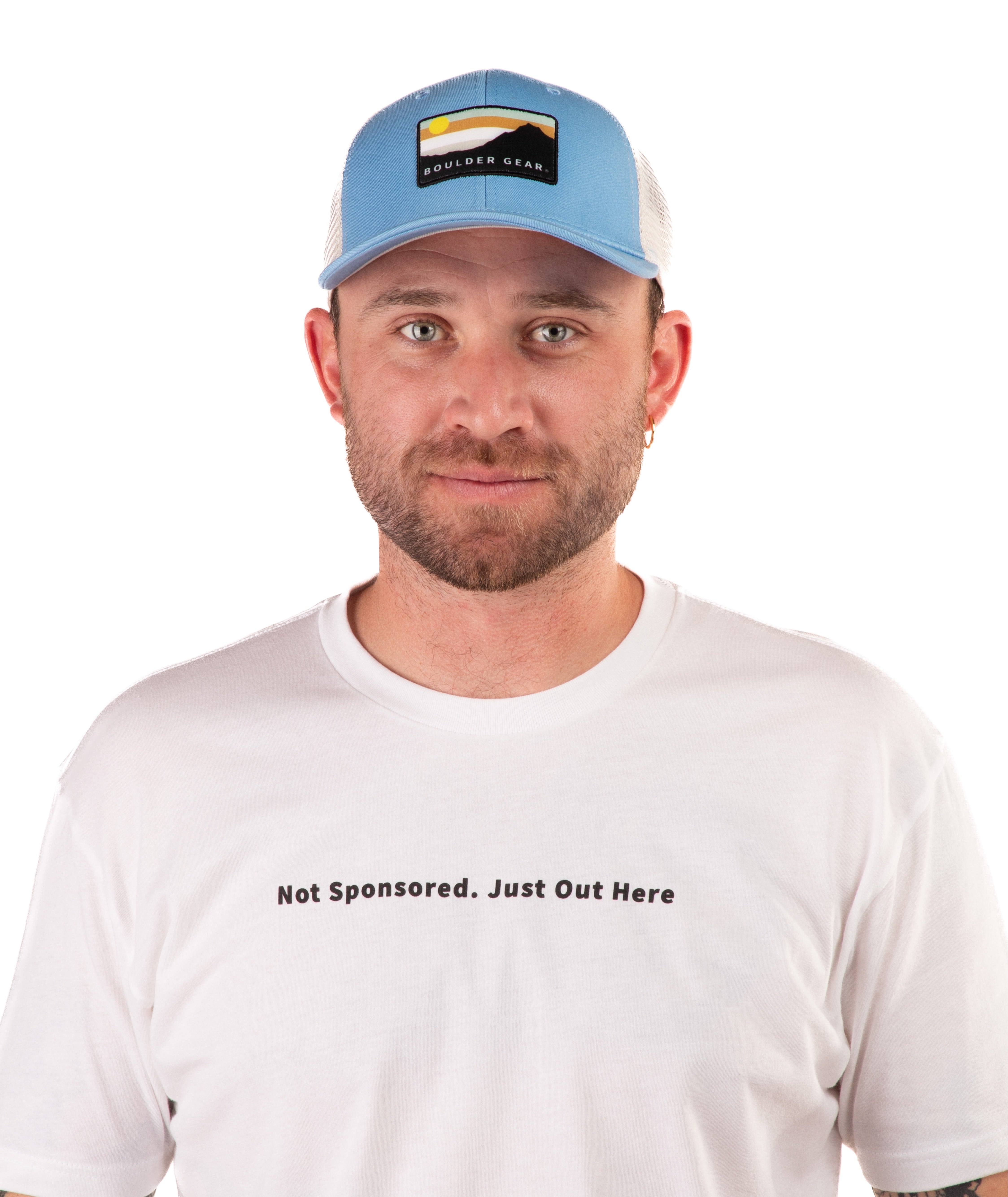 Man wearing a blue cap and white t-shirt with text on a white background