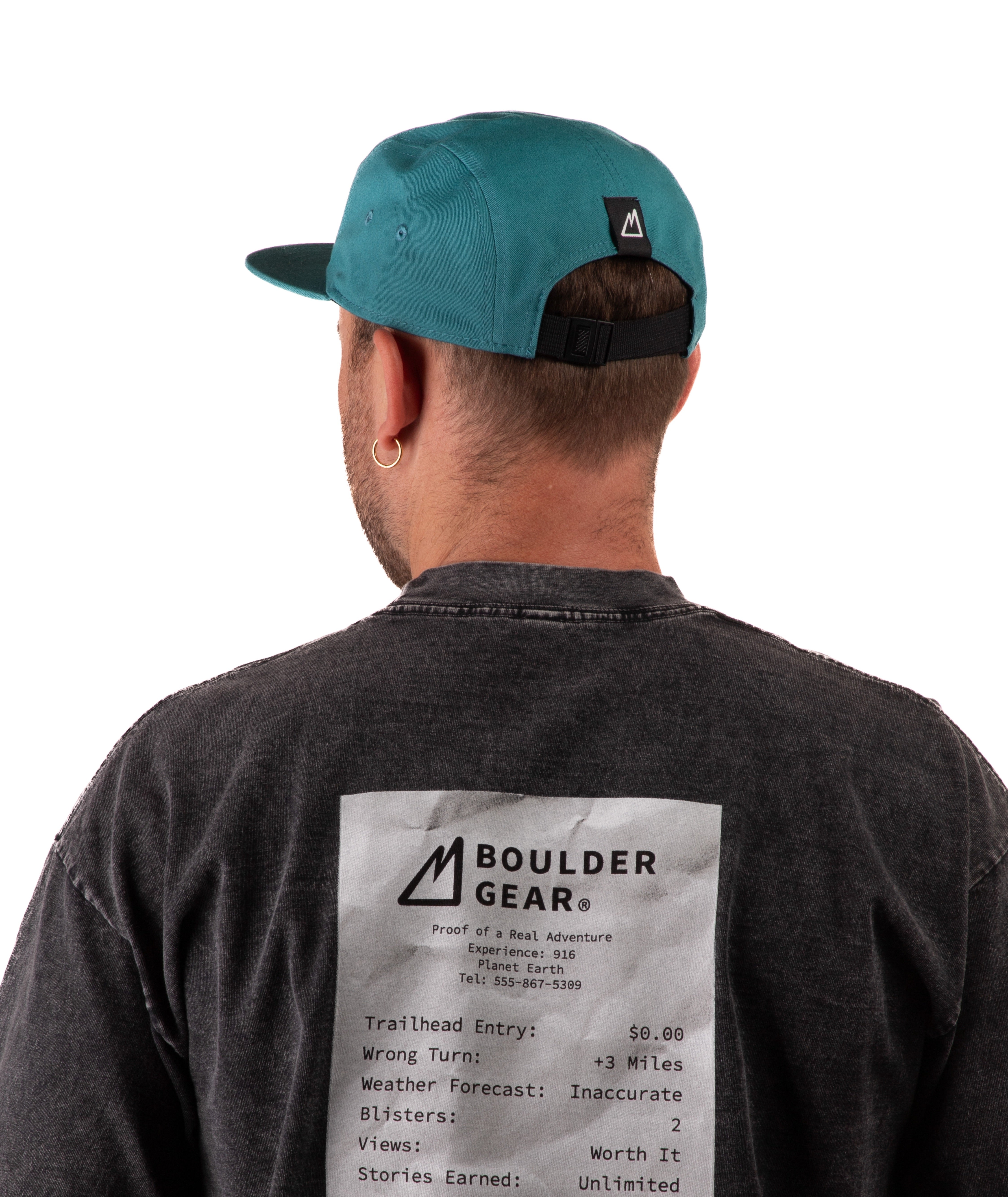 back of a Man wearing a black T-shirt and green cap with 'Boulder Gear' logo on a white background