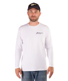 Man wearing a white long-sleeve shirt with a logo on a white background