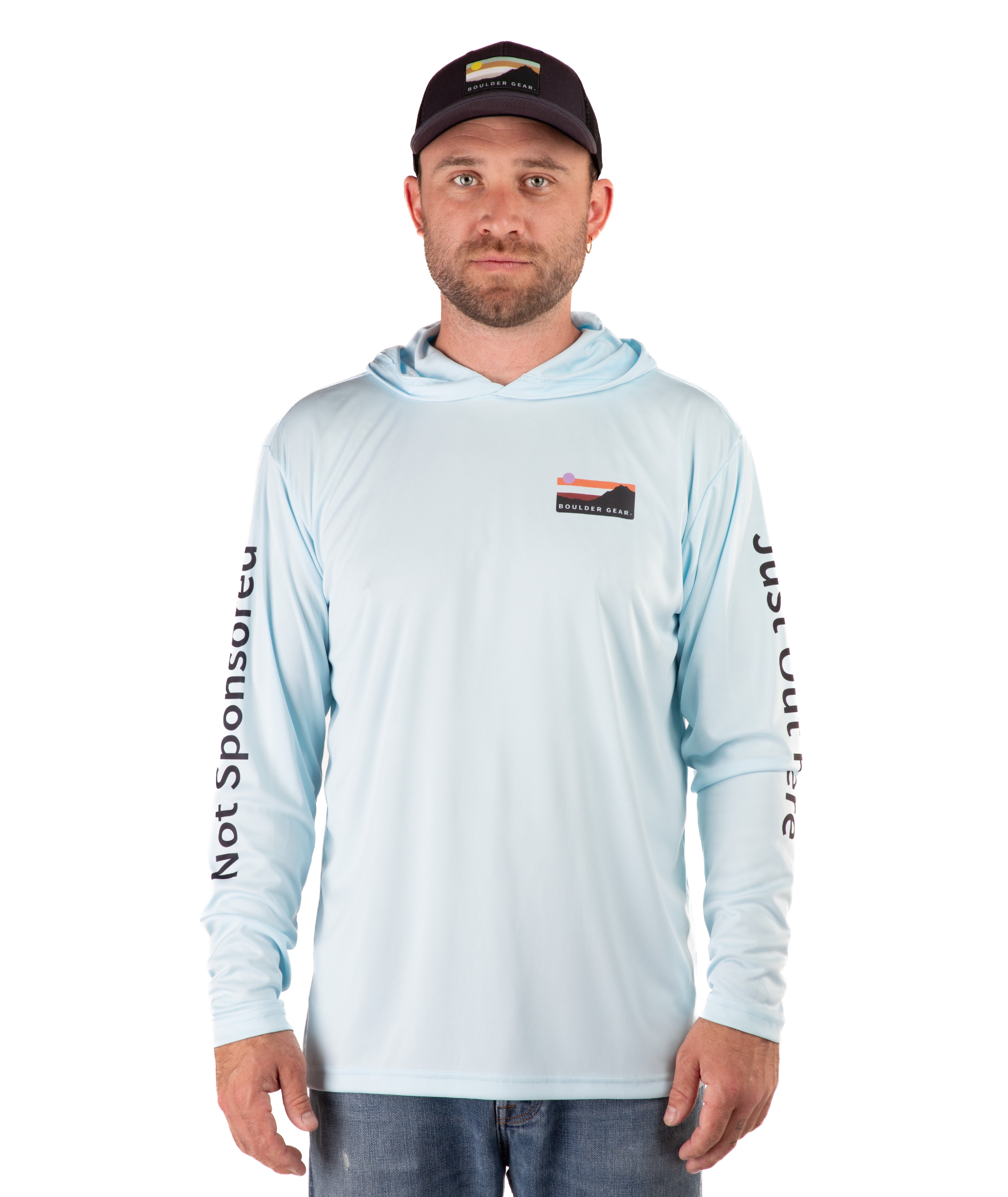 Man wearing a light blue long-sleeve hooded shirt with branding on a white background