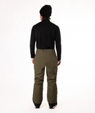 back of a person wearing a black shirt and green snow pants on a white background
