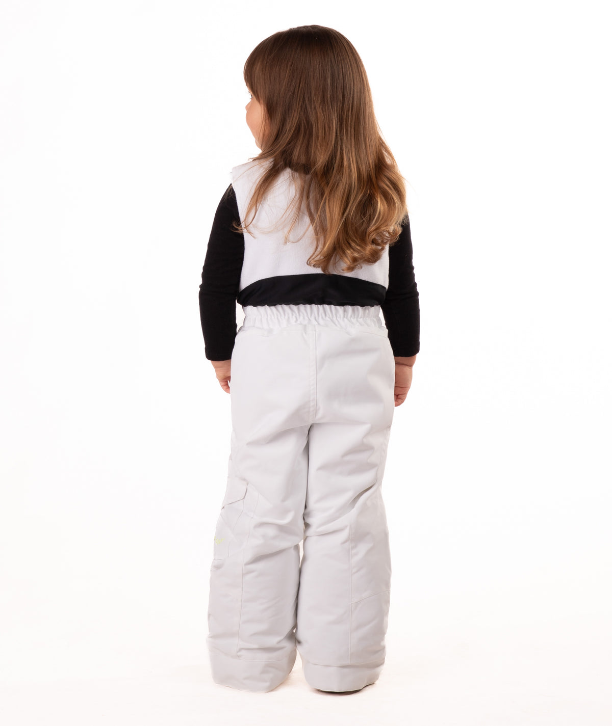 back of child wearing a white snow bib with black top on a white background